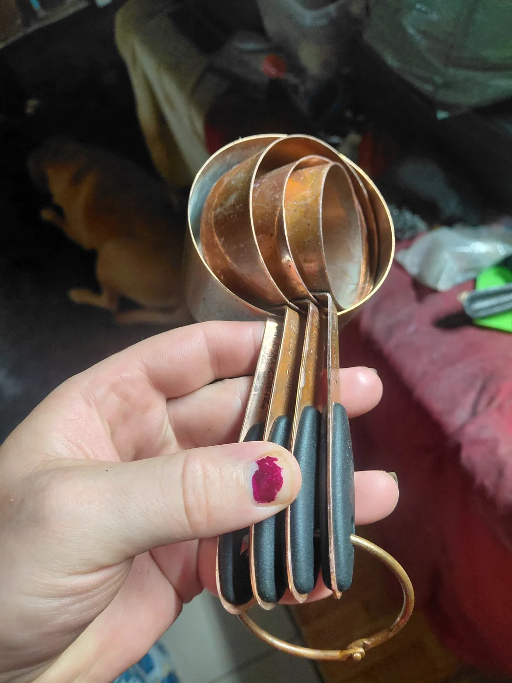set of copper-plated stainless steel measuring cups